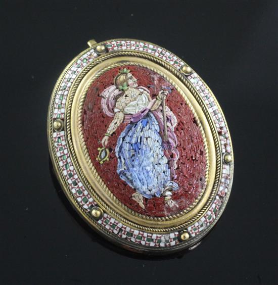 A 19th century gilt metal mounted oval micro mosaic brooch, 35mm.